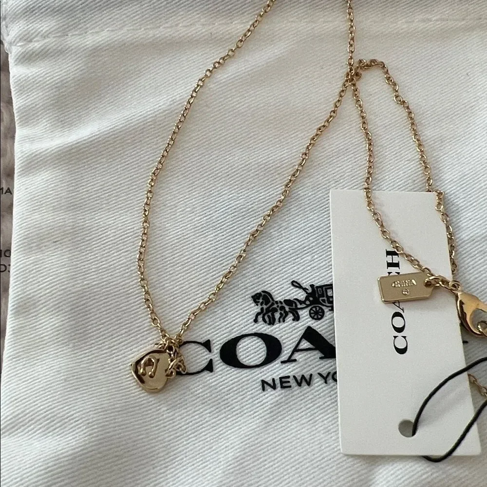 Coach Necklace with Heart-Shaped Pendant - Gold